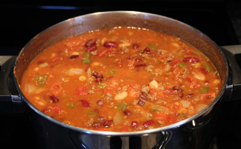 A pot full of hearty chili. Perfect for a cold winter's day.